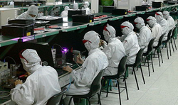 Workers in Foxconn factory in Shenzhen