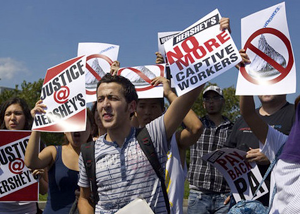 Foreign students protest at Hershey plant August 2011.