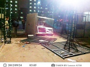 This photo allegedly shows a smashed guard booth at on of Foxconn's dormitories.