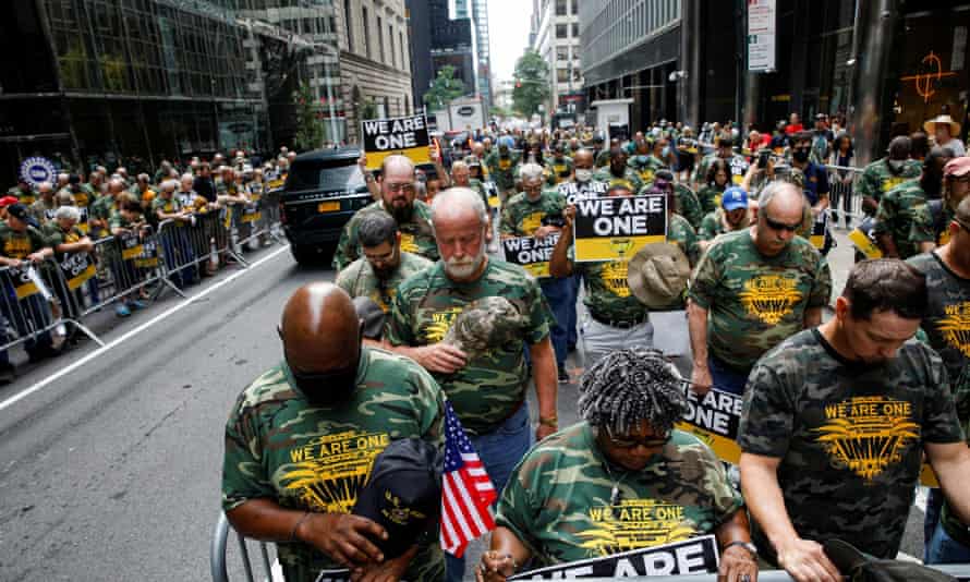 Members of UMWA and other labor leaders picket outside BlackRock’s headquarters in New York on Wednesday.